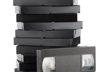 VHS video cassettes stacked